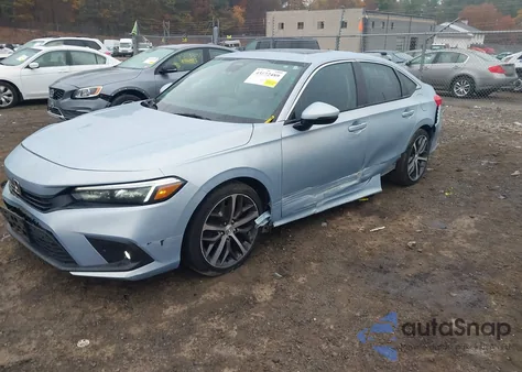 2022 Honda Civic Touring z USA, uszkodzony, nr VIN 2HGFE1F96NH300881